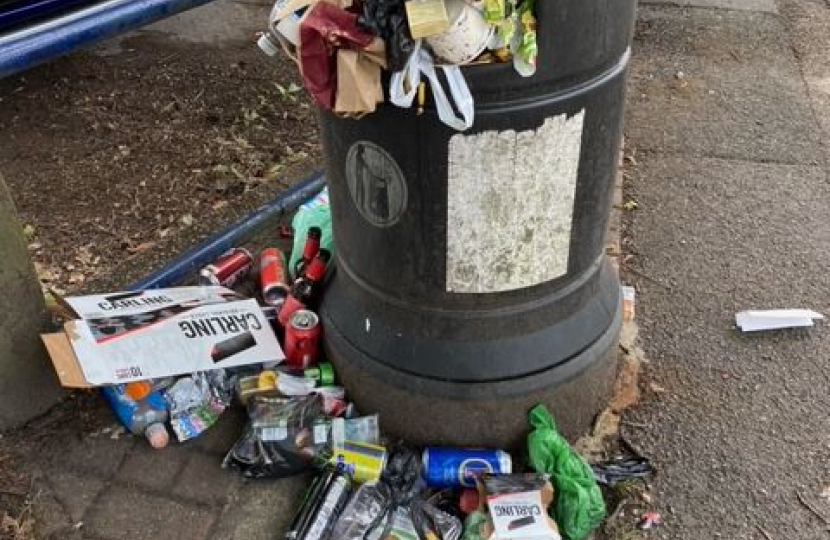 Overlowing litter bin