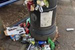 overflowing litter bin