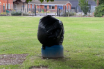 Litter bin covered with black bag