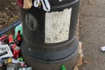 Overflowing litter bin