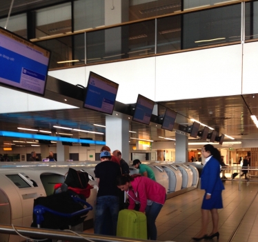 Airport people loading luggage