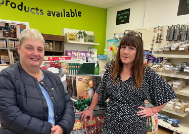 Pauline Jorgensen talking to Woodley shopkeeper