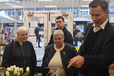 Pauline Jorgensen and Jeremy hunt in Woodley shops